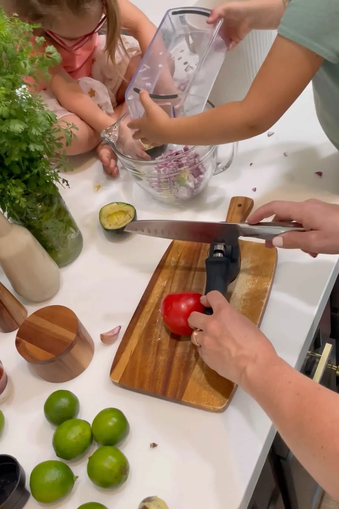 Using a kitchen knife sharpener. 